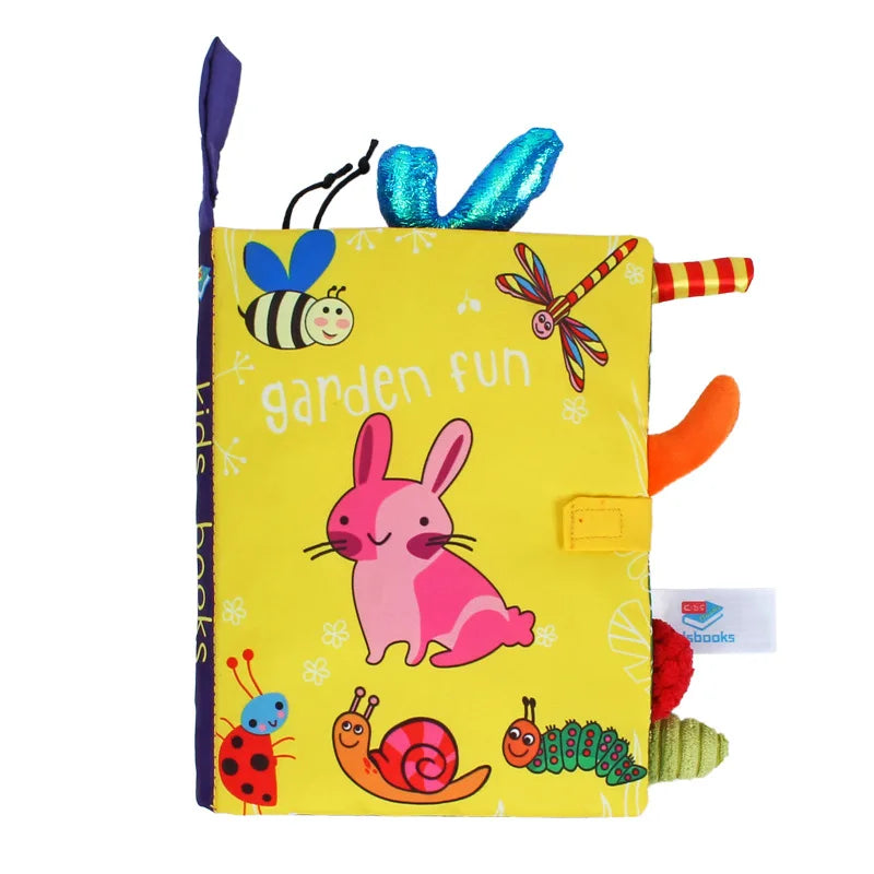 Livro de pano interativo para bebês de 0 a 36 meses com sons e chocalho, ideal para aprendizado precoce.