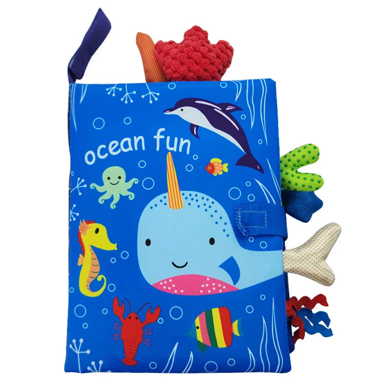 Livro de pano interativo para bebês de 0 a 36 meses com sons e chocalho, ideal para aprendizado precoce.